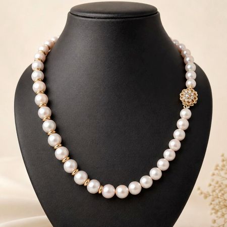 Handcrafted White Pearl Necklace with Gold Spacer Accents